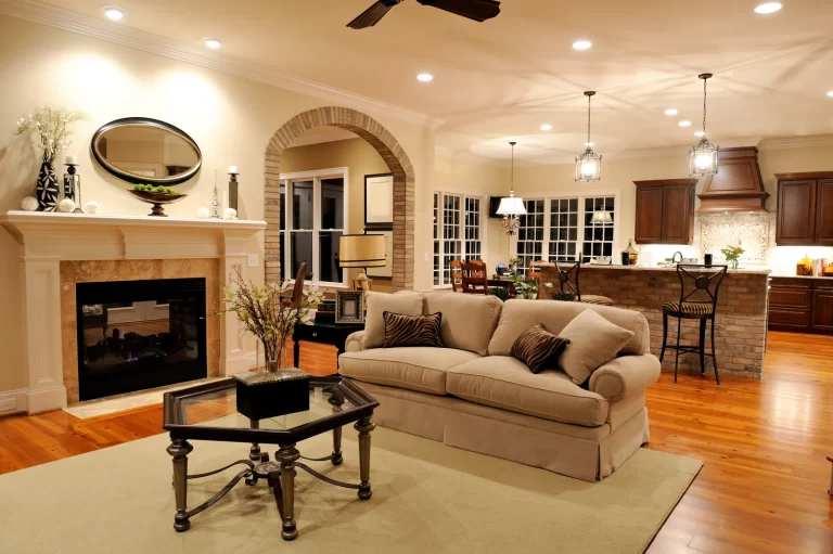 Spacious living room featuring updated flooring and fresh paint as part of a home renovation in Metro Vancouver and Lower Mainland.